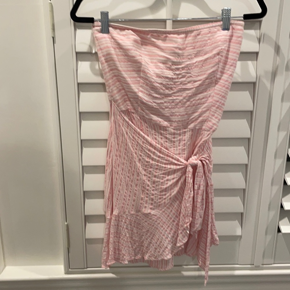 A pink strapless dress from a local boutique